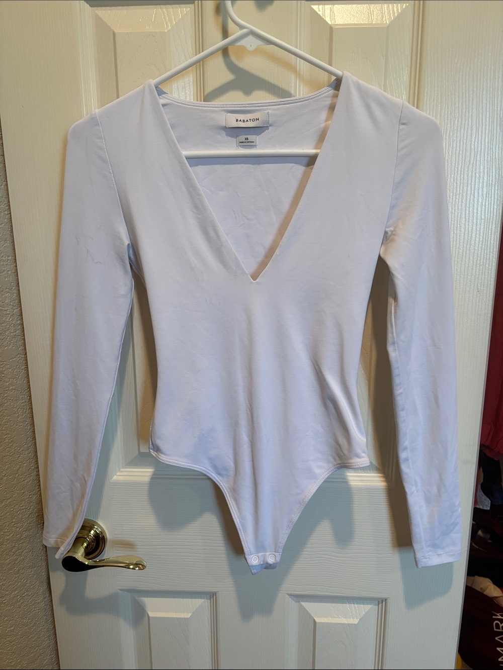 Babaton White Deep V-Neck Long Sleeve Bodysuit